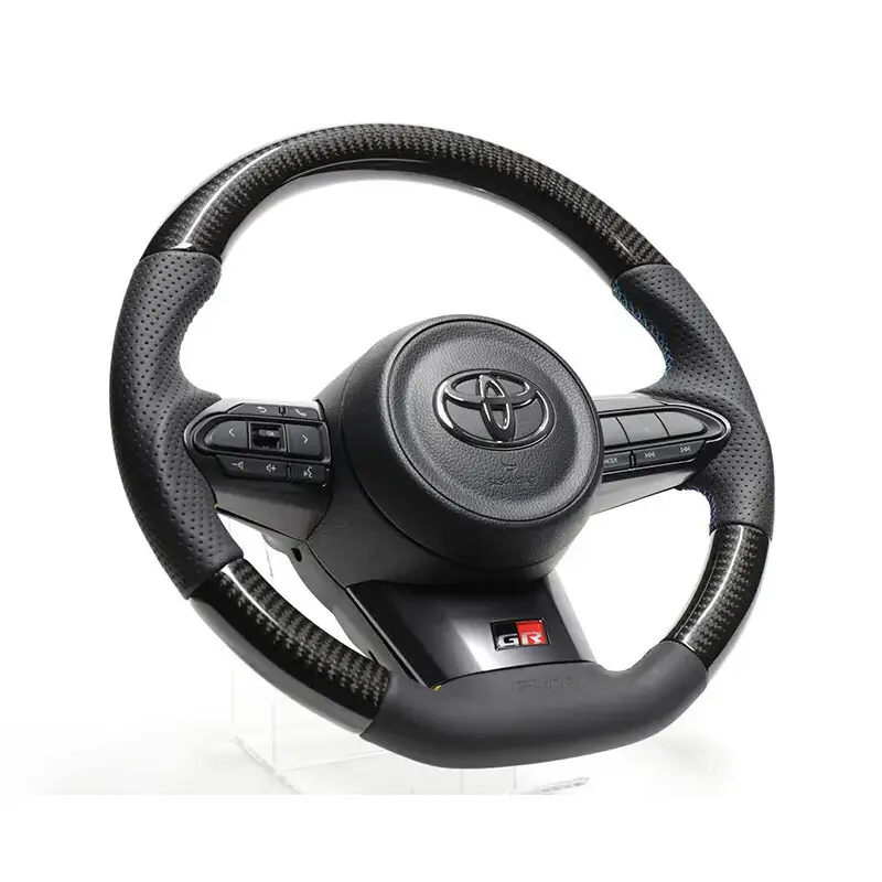 Volant GReddy Carbone Noir avec Coutures Tricolores pour Toyota Yaris GR Petit Prix